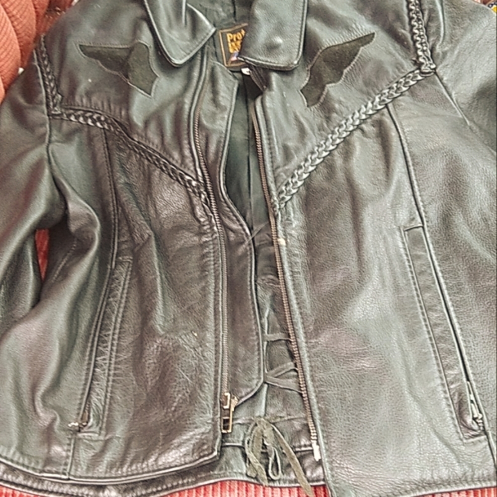 A female leather American made in the USA medium size biker jacket